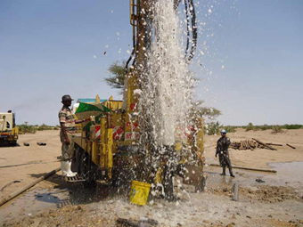 Water gushing out of a borehole at Napuu area during the flushing process.: Photograph © UNESCO/Nairobi Office
